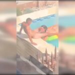 Poronoxx : Couple coloré suce une morsure dans une piscine